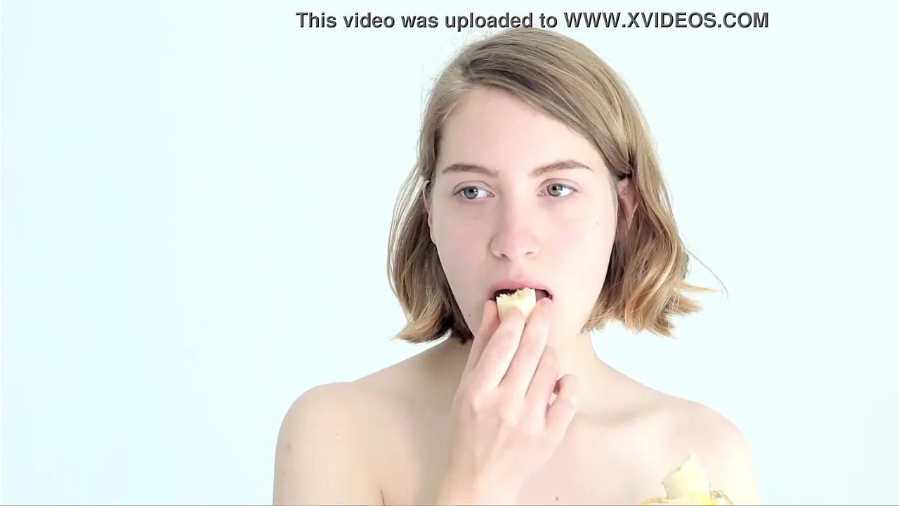 Blonde babe plays teasey game with a banana