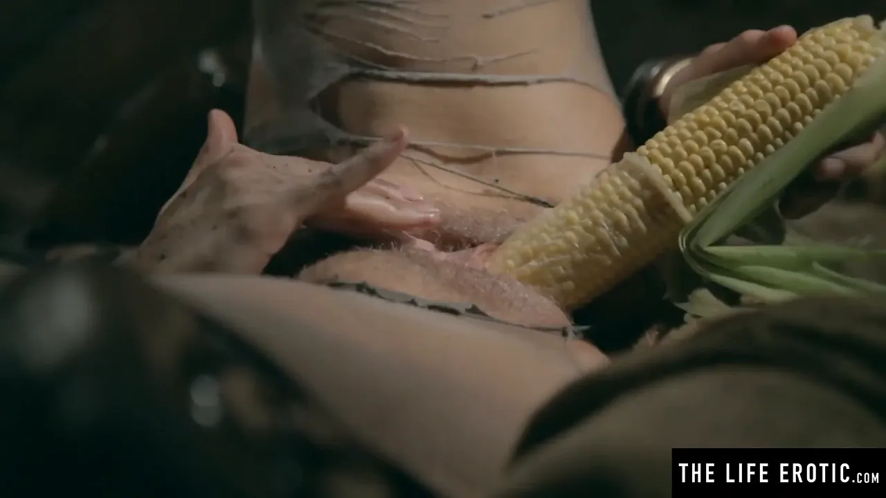Busty brunette masturbates to intense orgasm with Scarecrow's strange insertion