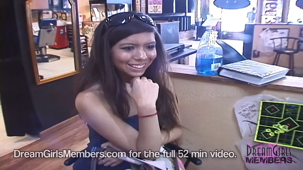 Brunette amateur gets 'DreamGirls' tattooed on her neck at the tattoo shop