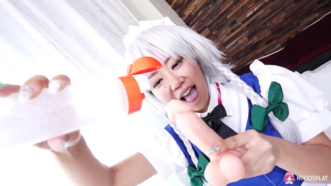 Anna Saotome, a petite Asian slut in cosplay costume, masturbates with a sex toy on the