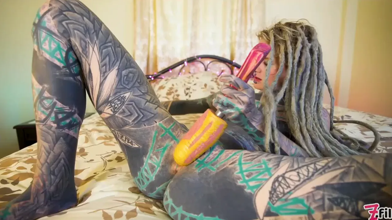 Tattooed girl's solo video shows her playing with herself and anal toys